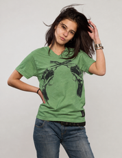 Woman wearing a green Crossed Pistols tee, front view