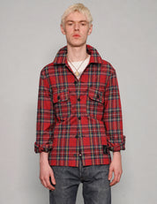 STUART TREVOR red tartan cotton workshirt buttoned up, showing black buttons and two chest pockets.