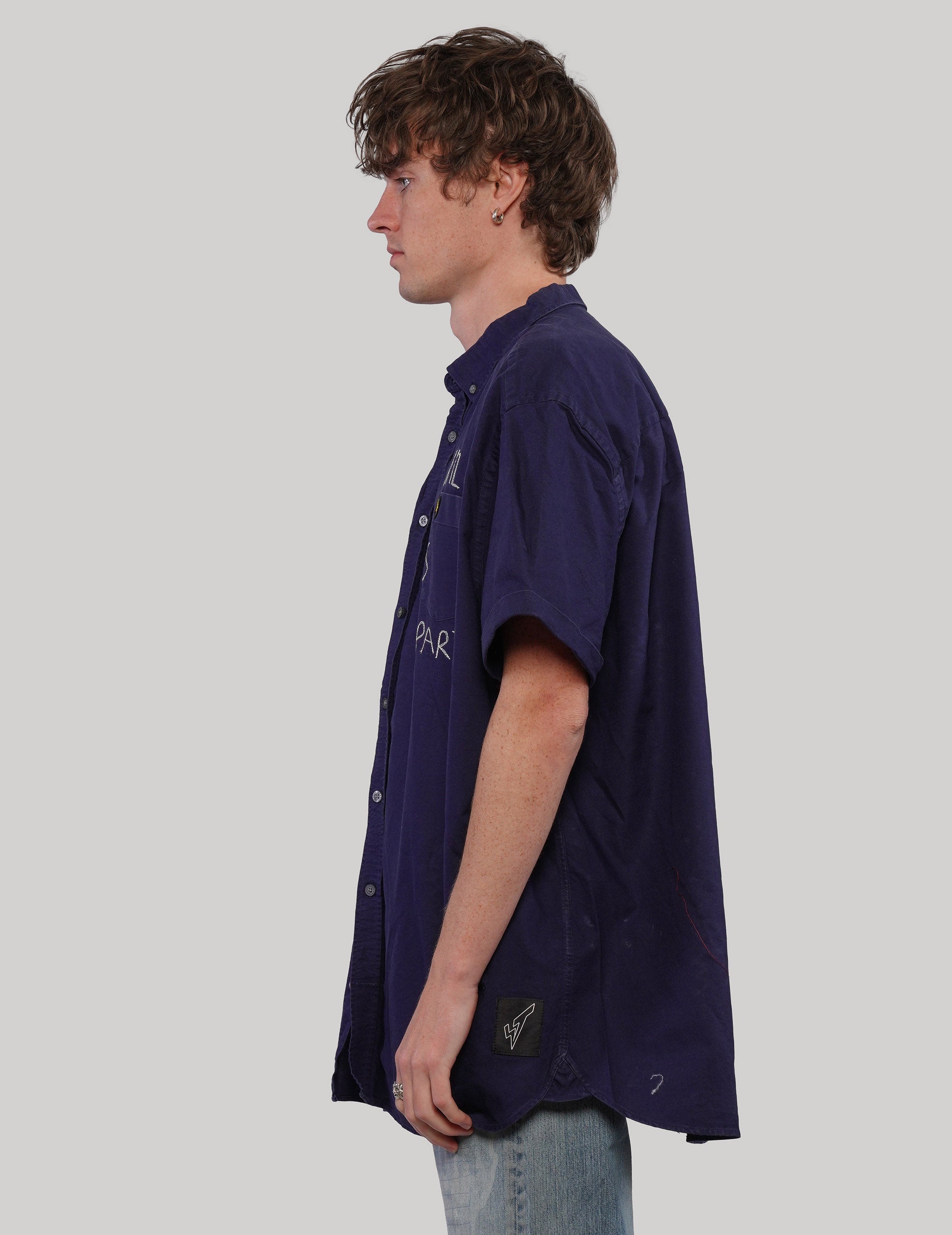 Love Will Tear Us Apart navy short-sleeve shirt, front model view