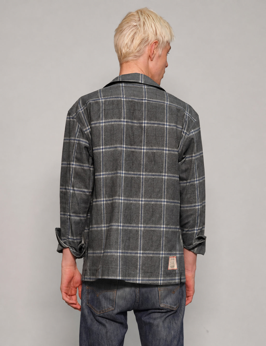 Back view of STUART TREVOR charcoal workshirt showing navy and cream windowpane checks.