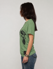 Green Crossed Pistols tee on a woman, back view