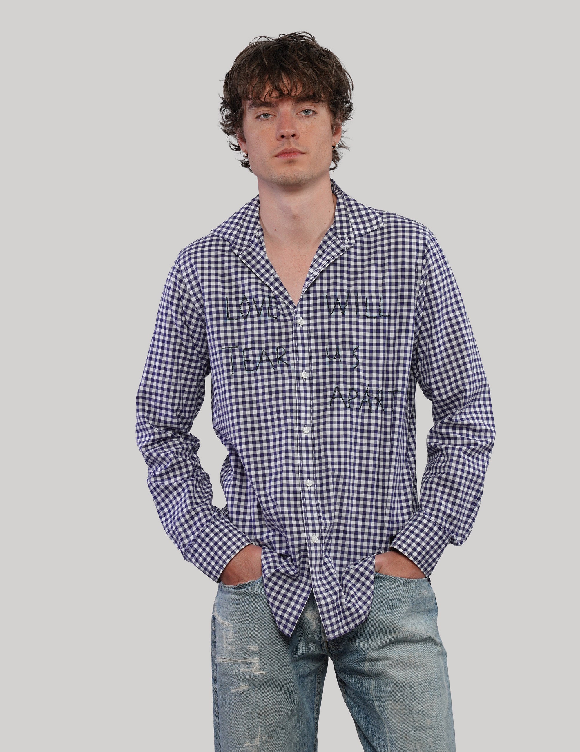 Navy and white Love Will Tear Us Apart gingham shirt, straight front view