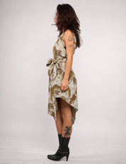 STUART TREVOR ivory tiger-print Pirate Dress – left side view with matching fabric belt tied at waist.