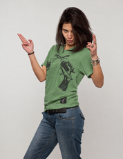 Woman styling the green Crossed Pistols tee