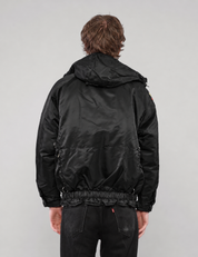 Black hooded clasp-front jacket, sleeve patch and side view