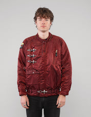 Front view of a burgundy clasp-front jacket without the hood.