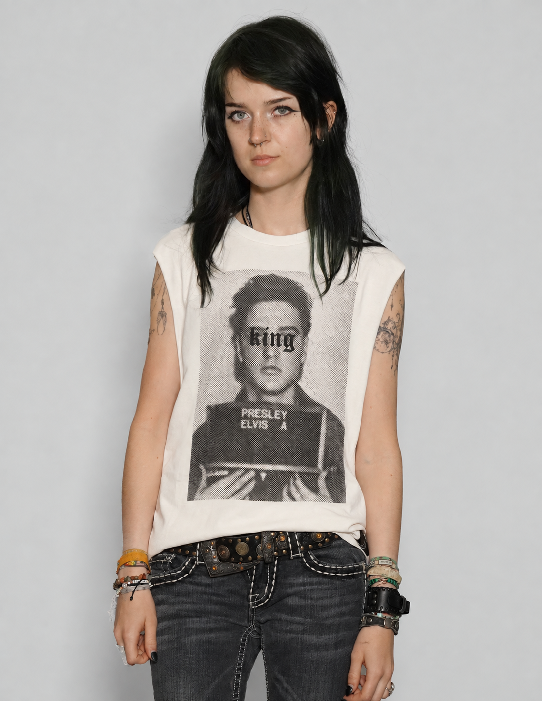 Front view of model wearing ecru King vest with Elvis Presley graphic