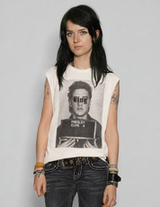 Front view of model wearing ecru King vest with Elvis Presley graphic