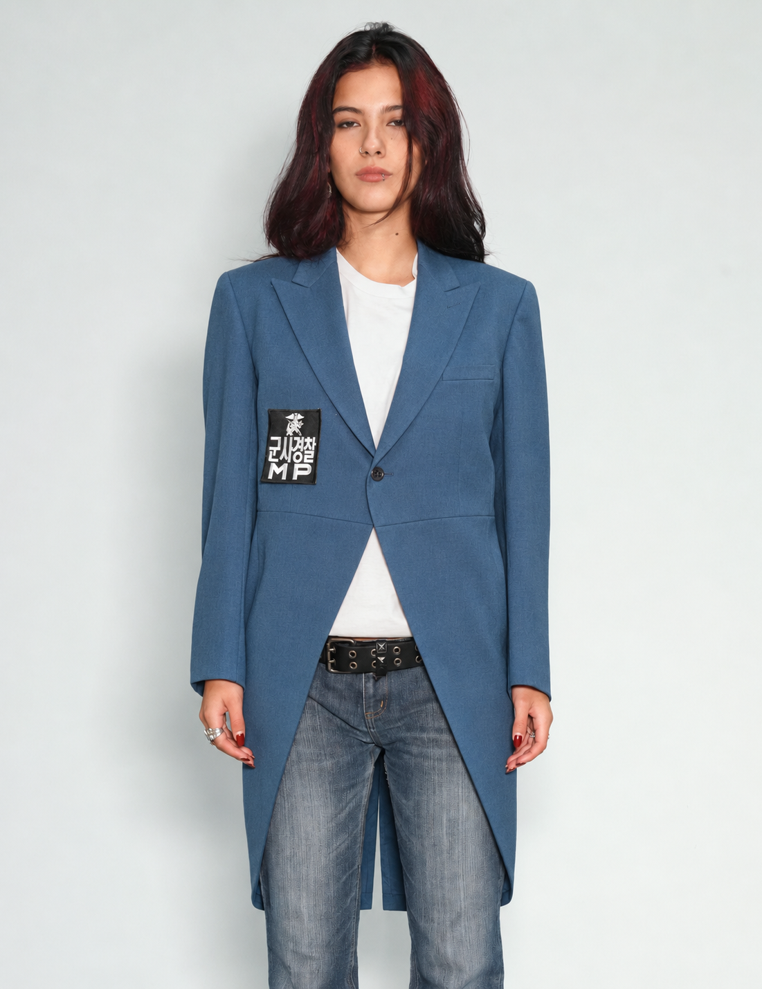 Blue Edwardian tailcoat on model, front view