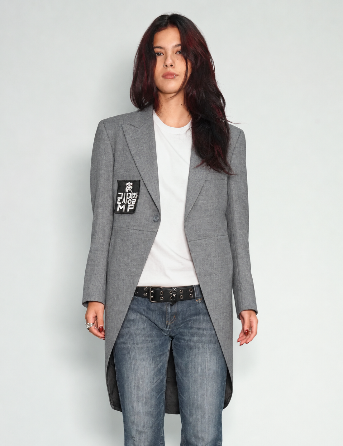 Light grey Edwardian tailcoat on model, angled front view