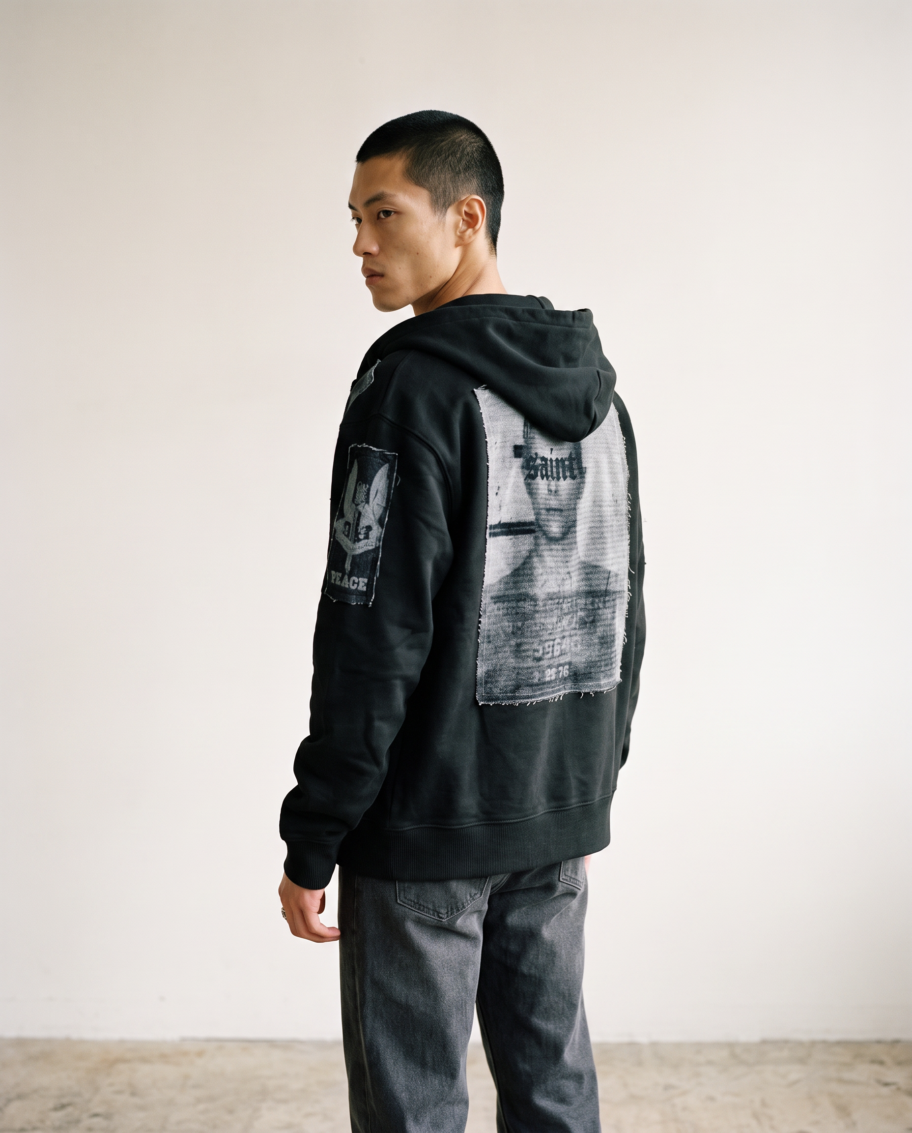 No_Prisoners_Hoodie_open_with_back_and_side_posed.png