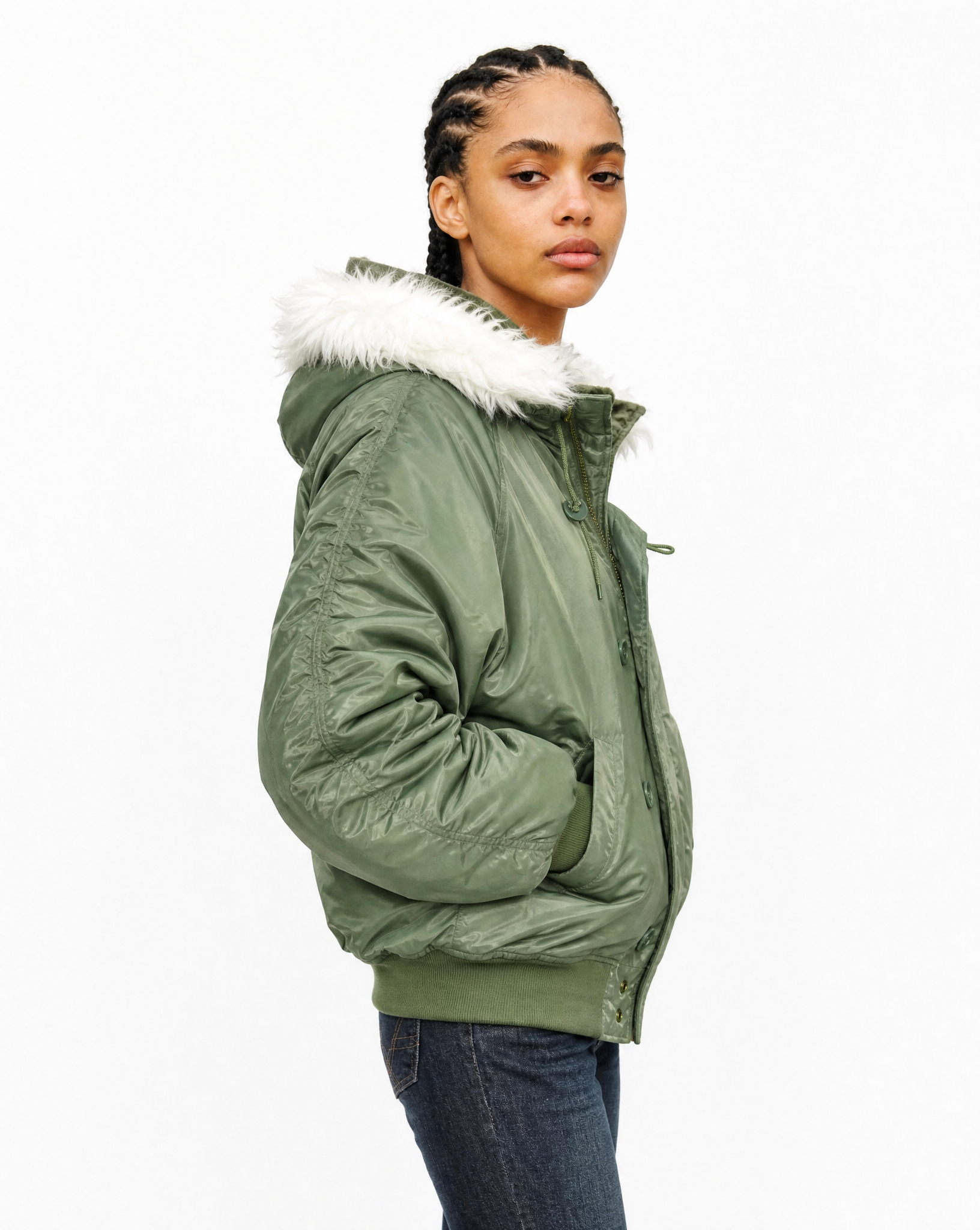 Side view of the green hooded flying jacket, showing the sleeve and body length