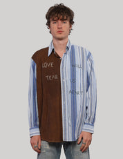 Full front view of the brown and blue split shirt with contrasting fabric panels and 'Love Will Tear Us Apart' lettering.