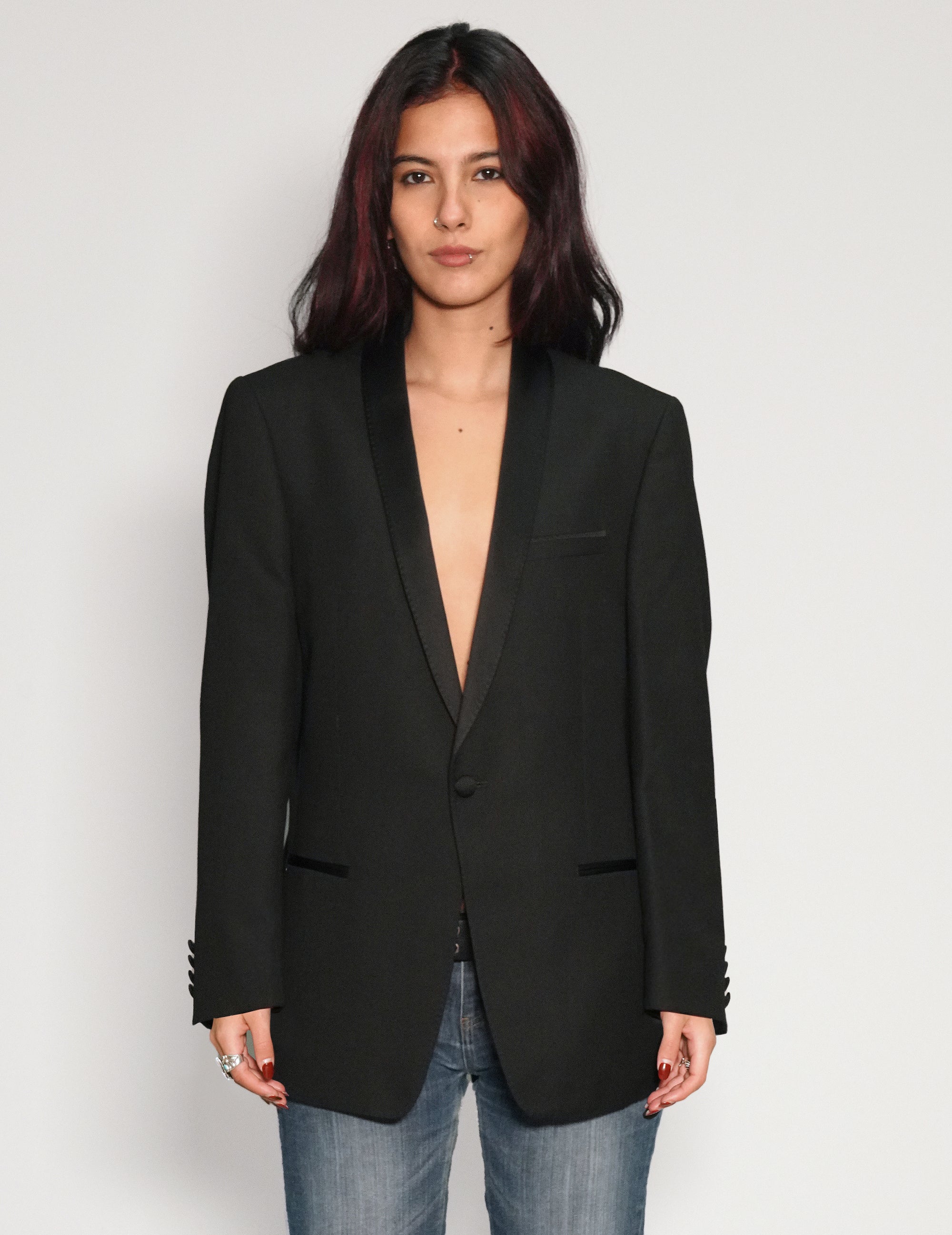 Black Party Back tuxedo jacket worn open, front view, with blue jeans