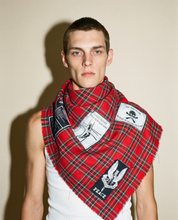 Red tartan Highland Riot patched scarf worn draped, studio shot
