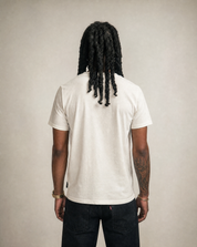 Back view of the plain ecru Saint t-shirt
