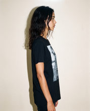 Side view of the black Saint t-shirt