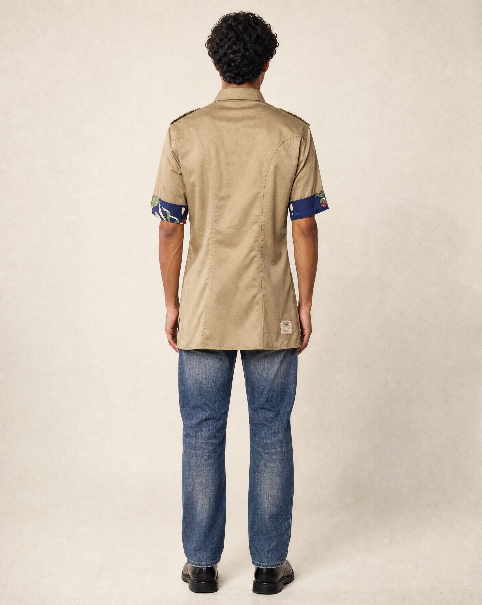 Back view of the reworked olive green military shirt